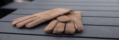 The History of Sheepskin Gloves: From Function to Fashion